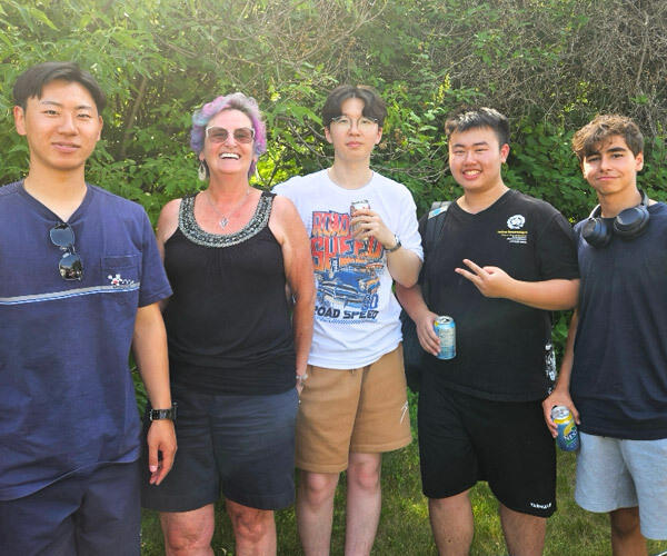 Kim with students at the Homestay BBQ.