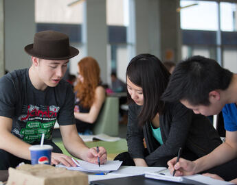 Students studying at the TFDL