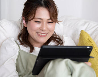 Student on tablet.